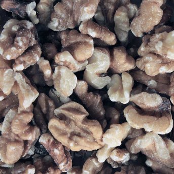 Organic Walnut Pieces — extreme close-up