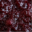 Organic plum jam extreme close-up