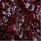 Organic plum jam extreme close-up