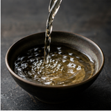 Organic brown rice vinegar being poured