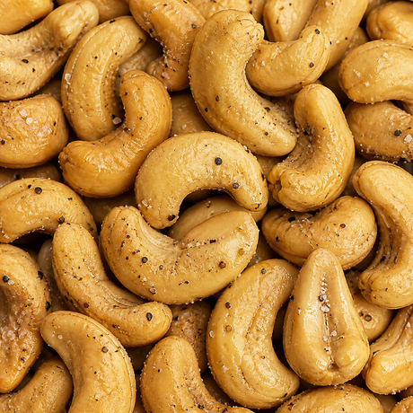 Extreme close-up of roasted and salted cashew nuts