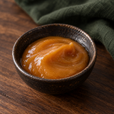 Taylor Pass Reserve Mānuka Honey UMF 5+ in dark ceramic bowl