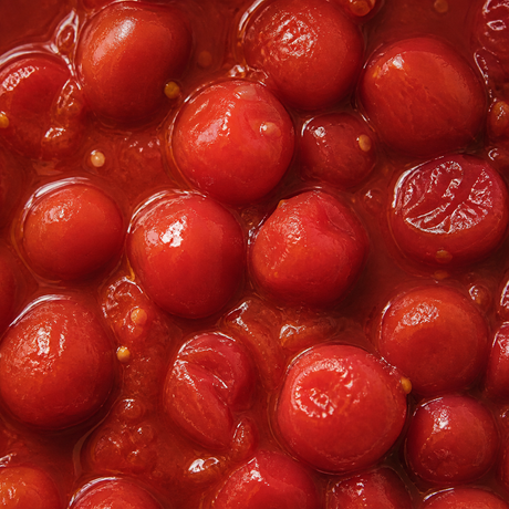 Biona organic whole cherry tomatoes extreme close-up