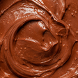 Essential organic chocolate and hazelnut spread extreme close-up