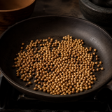 Toasting organic coriander seeds